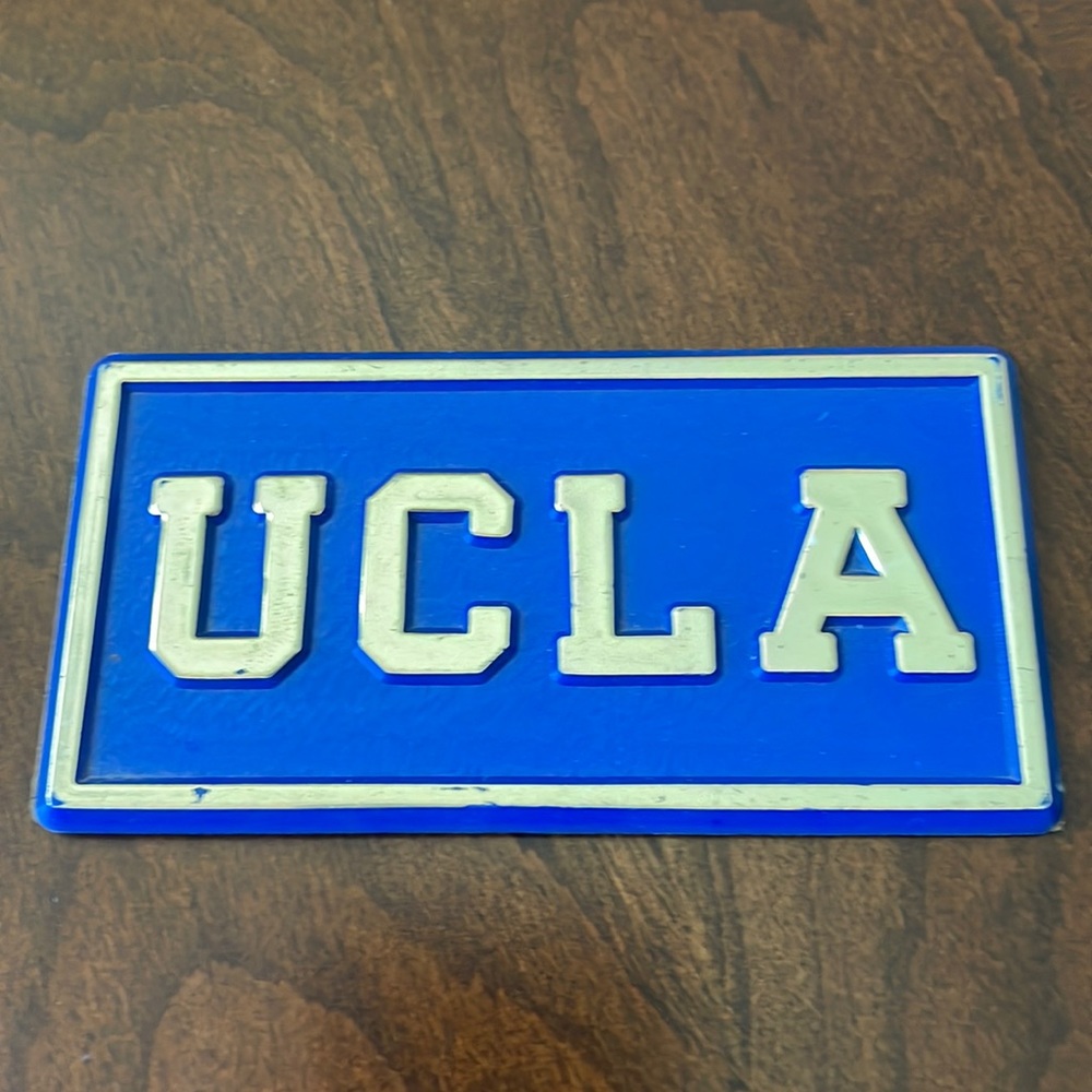 UCLA vintage plastic decal plaque blue & silver color
